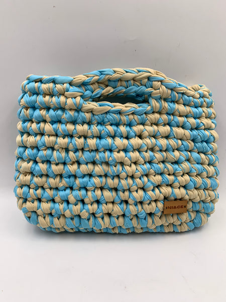 Bolsa de mano en menta y arena