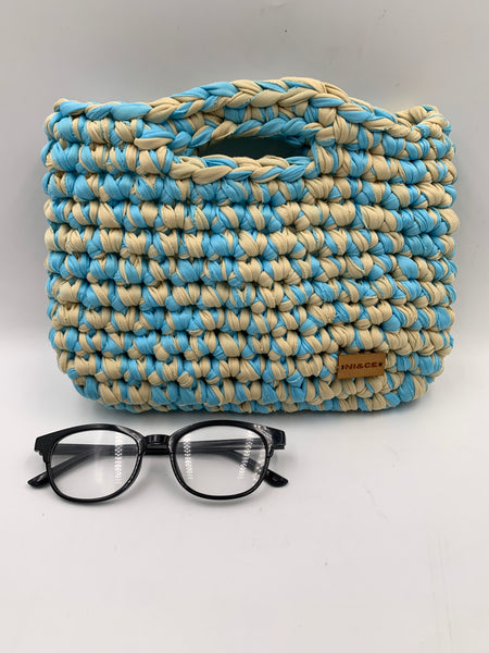 Bolsa de mano en menta y arena